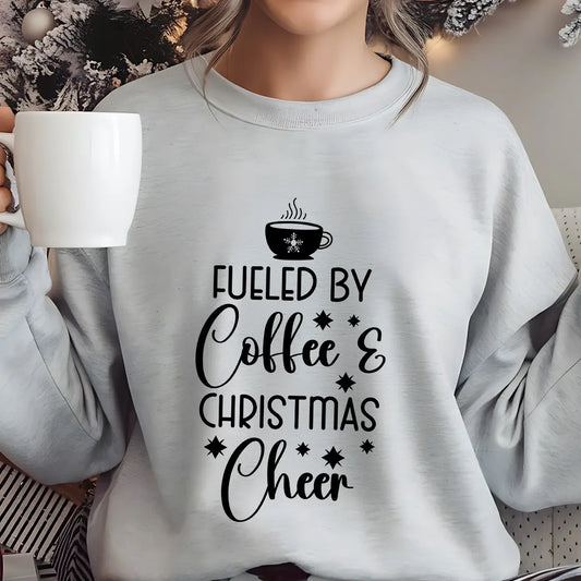 Grey sweatshirt with “Fueled by Coffee & Christmas Cheer” DTF design featuring a steaming coffee cup and stars.