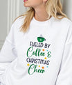 White sweatshirt with colorful “Fueled by Coffee & Christmas Cheer” design featuring a green coffee cup and festive stars.