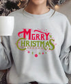 Gray sweatshirt with red and green “Merry Christmas” DTF design featuring hanging ornaments and stars.