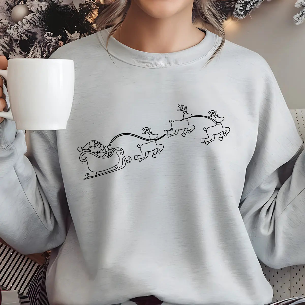 Grey sweatshirt with minimalist black outline DTF transfer showing Santa’s sleigh and three flying reindeer.