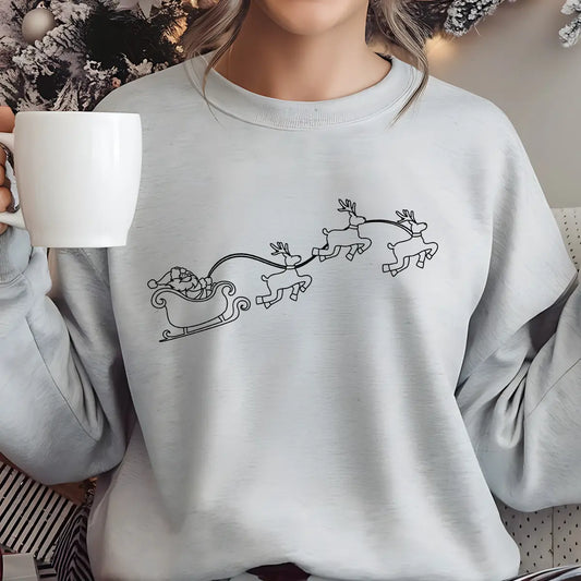 Grey sweatshirt with minimalist black outline DTF transfer showing Santa’s sleigh and three flying reindeer.