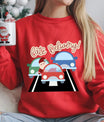 Red sweatshirt featuring a colorful “Late Delivery” DTF transfer design with Santa stuck in traffic, funny Christmas shirt design.