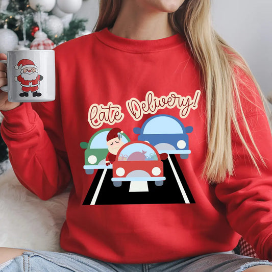 Red sweatshirt featuring a colorful “Late Delivery” DTF transfer design with Santa stuck in traffic, funny Christmas shirt design.