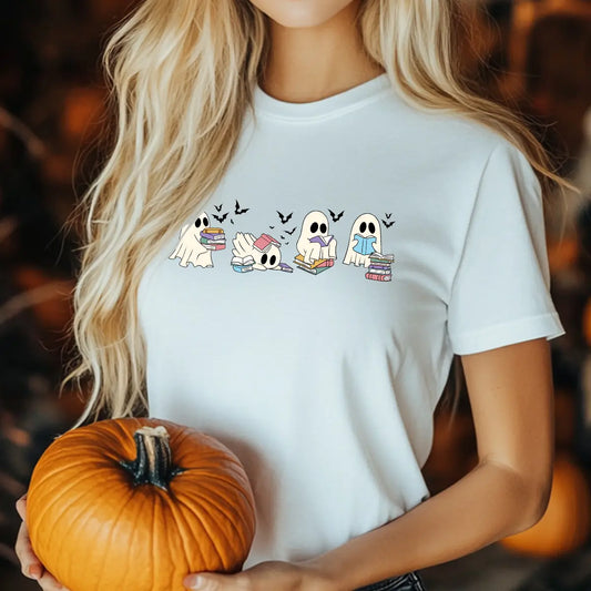 White t-shirt with four cute reading ghosts and flying bats—Bookish Halloween DTF transfer for cozy fall readers.