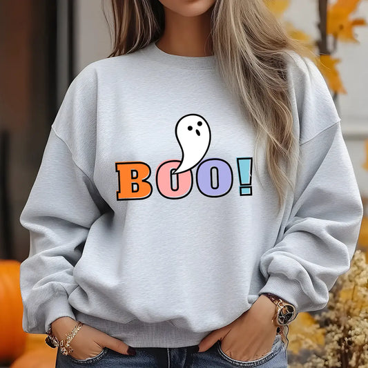 Gray sweatshirt with colorful “BOO!” Halloween DTF transfer design featuring a cute white ghost popping out of the letter O.