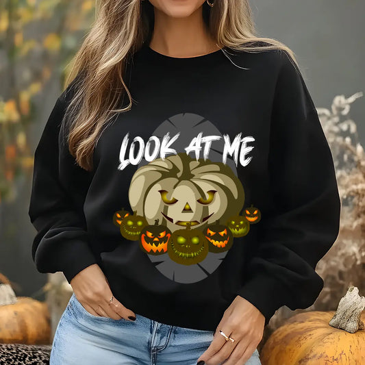 Black sweatshirt featuring “Look At Me” Halloween DTF design with creepy glowing pumpkins and spooky jack-o’-lantern faces.