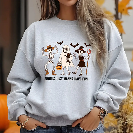 Grey sweatshirt with “Ghouls Just Wanna Have Fun” DTF transfer featuring dancing skeletons, ghost, and bats in a cute Halloween design.