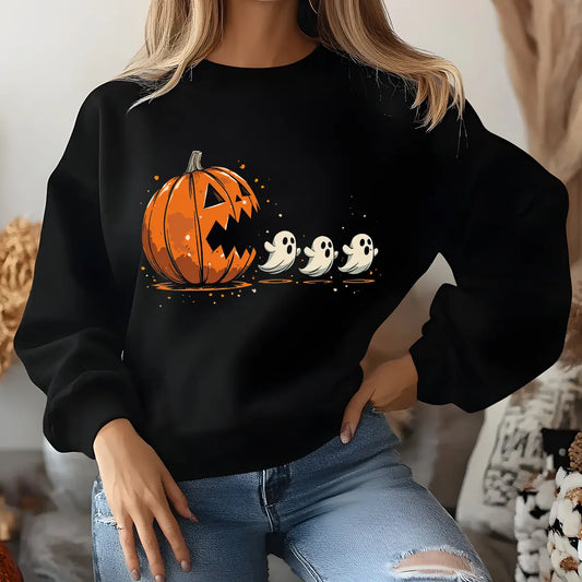 Black sweatshirt with Halloween design of a jack-o’-lantern chasing three cute ghosts, funny fall DTF transfer.