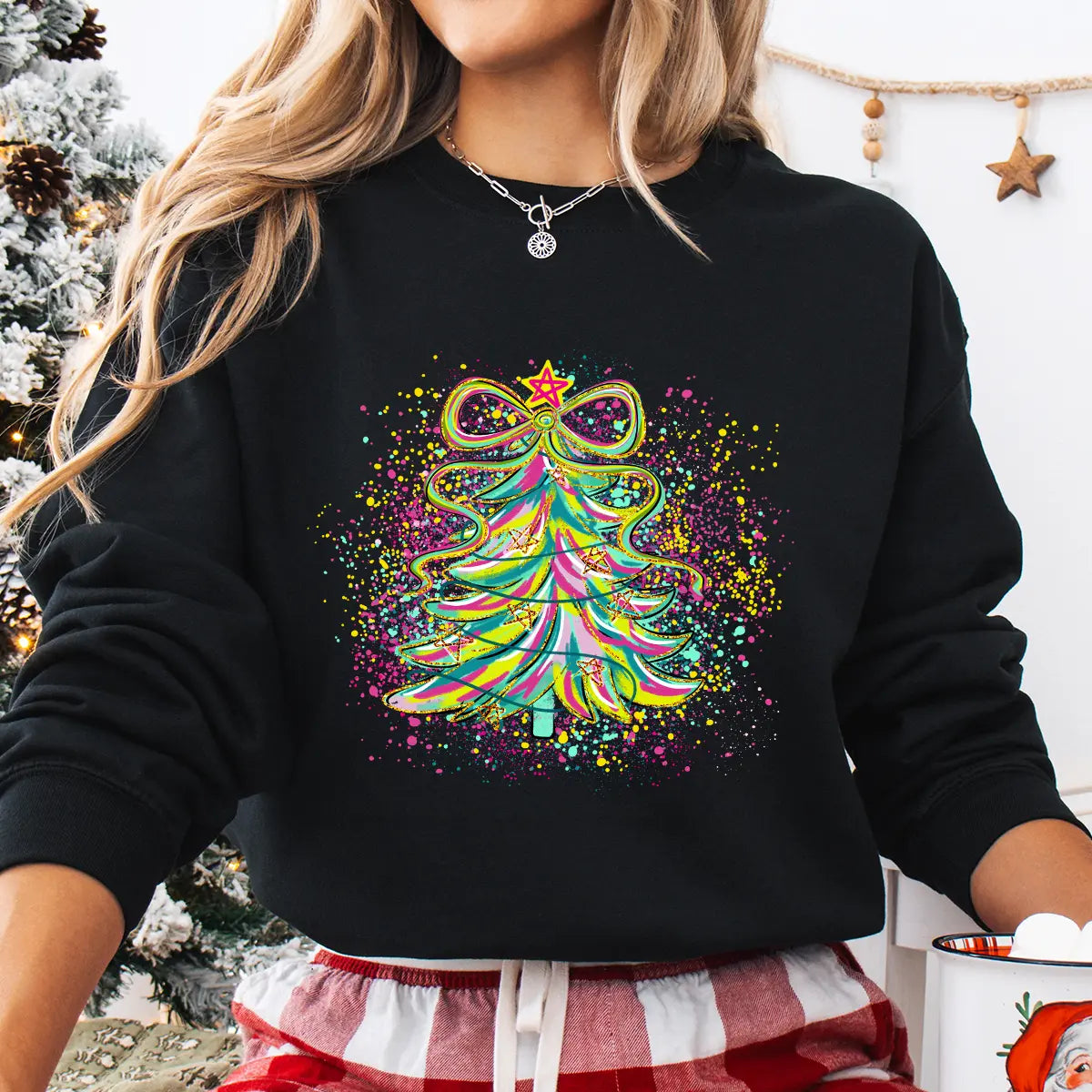Sweatshirt featuring a Christmas-themed DTF transfer.