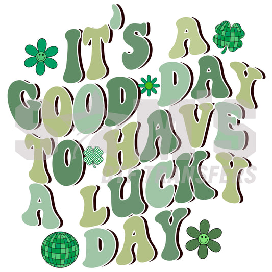 Stylized quote 'It's a Good Day to Have a Lucky Day' with shamrock accents for St. Patrick's Day.