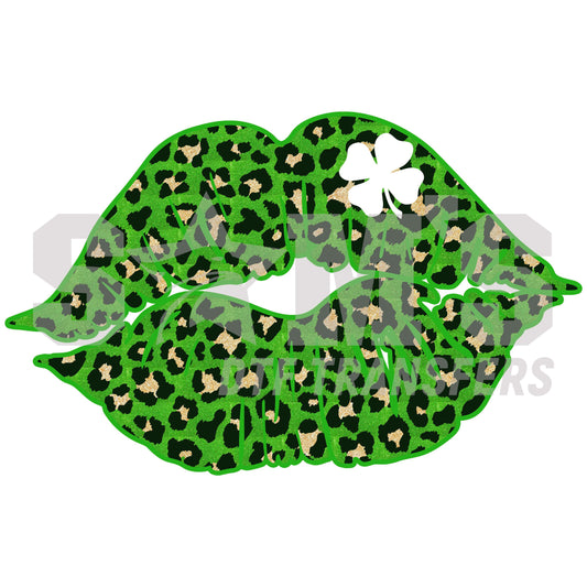 Graphic of lips with a green leopard print and clover pattern, a white clover accent on the lip, for St. Patrick's Day.