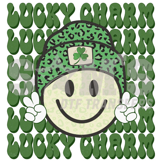 A cheerful face with a green leopard print hat and a four-leaf clover, surrounded by 'Lucky Charm' text in a St. Patrick's Day theme.