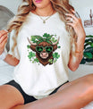 Highland cow St. Patrick’s Day ready-to-press DTF transfer with shamrock sunglasses, green bandana, and clovers