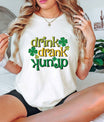 Drink Drank Drunk St. Patrick’s Day ready-to-press DTF transfer with shamrocks and festive lettering