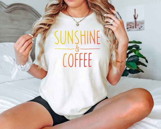 Sunshine & Coffee DTF Transfer with vibrant orange and yellow text on a cozy t-shirt, perfect for creating custom t-shirts.