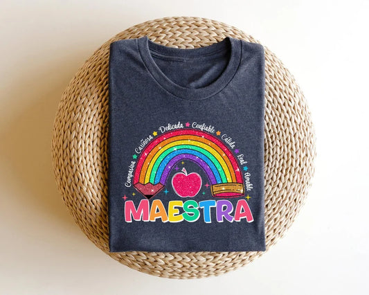 Maestra Rainbow DTF Transfer on dark T-shirt with teacher appreciation words and colorful design.