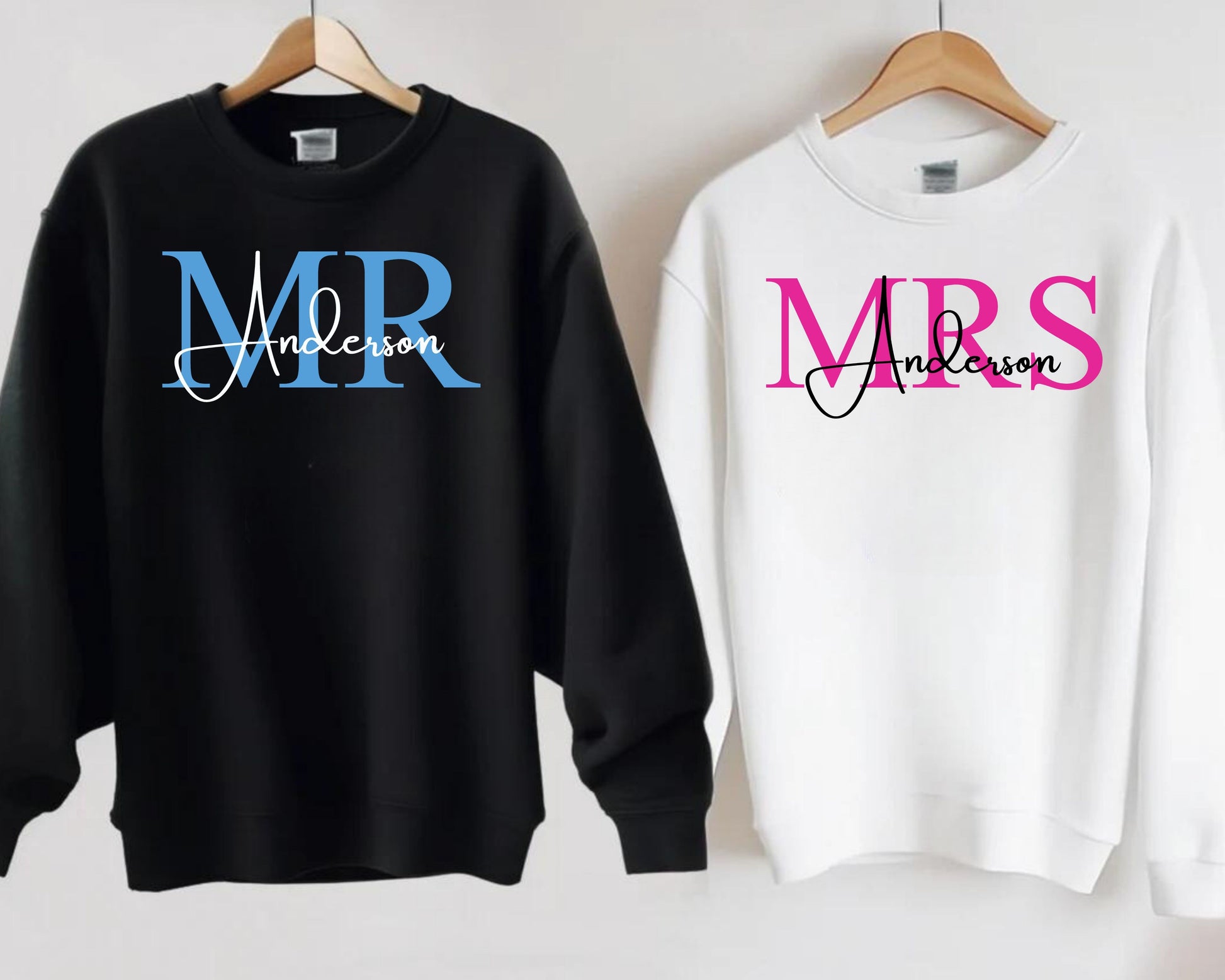 Mr. and Mrs. Customizable DTF Transfer design featuring last name personalization on black and white sweatshirts.