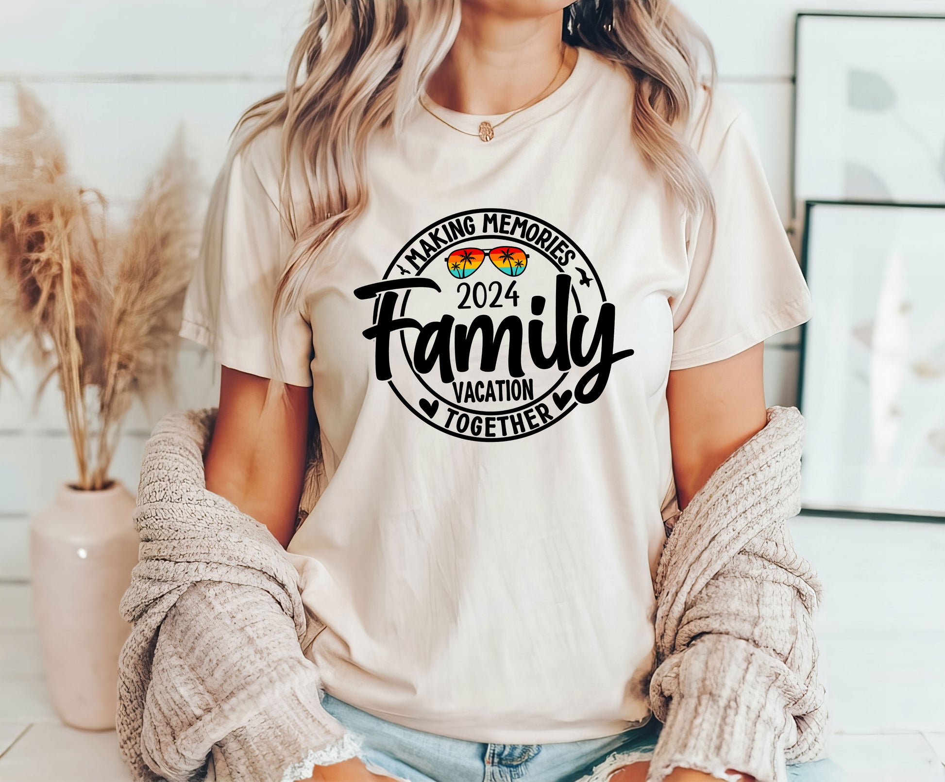 2024 Family Vacation DTF Transfer design on a cream-colored T-shirt worn by a woman.

