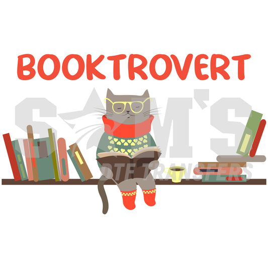 A stylish cat with glasses and a scarf, surrounded by colorful books, with the word "BOOKTROVERT" written above, a custom design by Sam's DTF Transfers