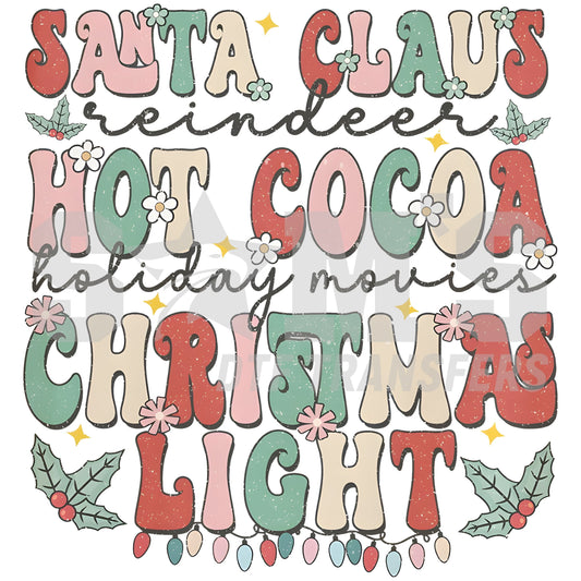 Colorful typography featuring Christmas-themed words like 'Santa Claus,' 'Reindeer,' 'Hot Cocoa,' 'Holiday Movies,' and 'Christmas Lights' decorated with stars, flowers, and holly leaves designed for custom DTF Transfers