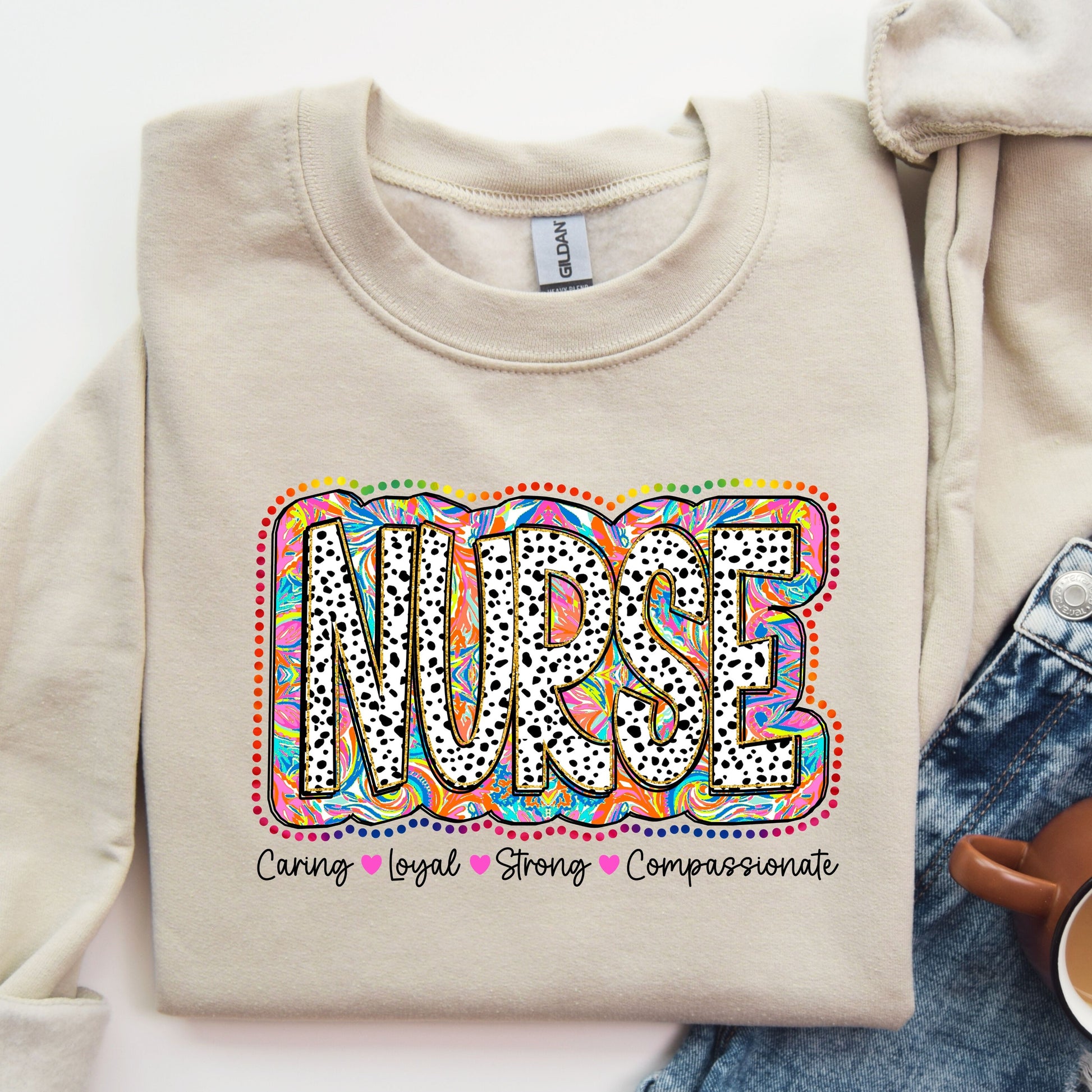 Colorful nurse-themed DTF transfer design with polka dots, vibrant patterns, and inspirational words.